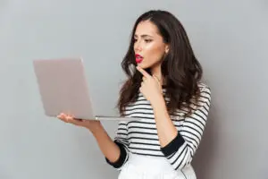 neobus earn money women looking at laptop